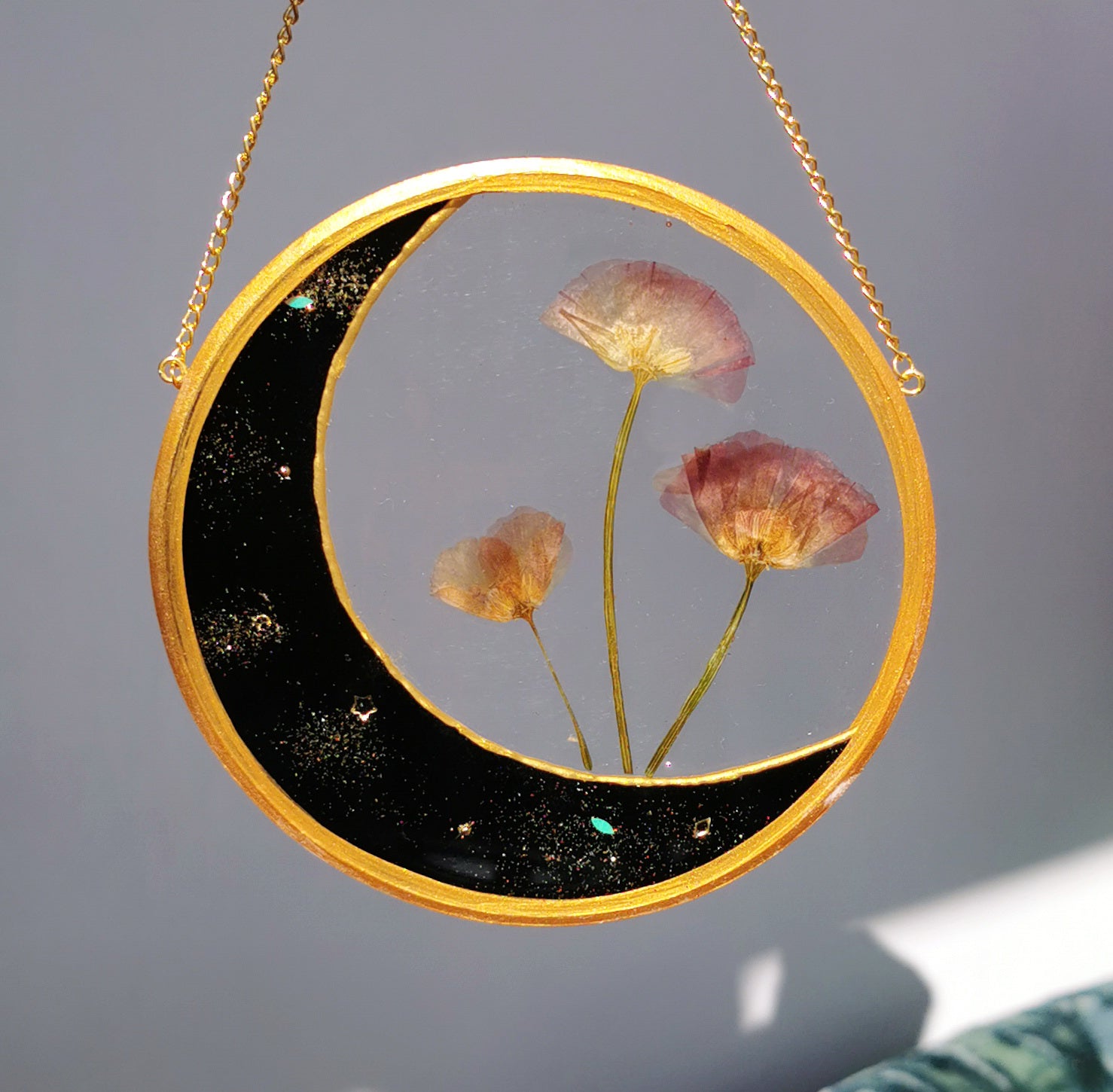 Resin moon art with real dried flowers