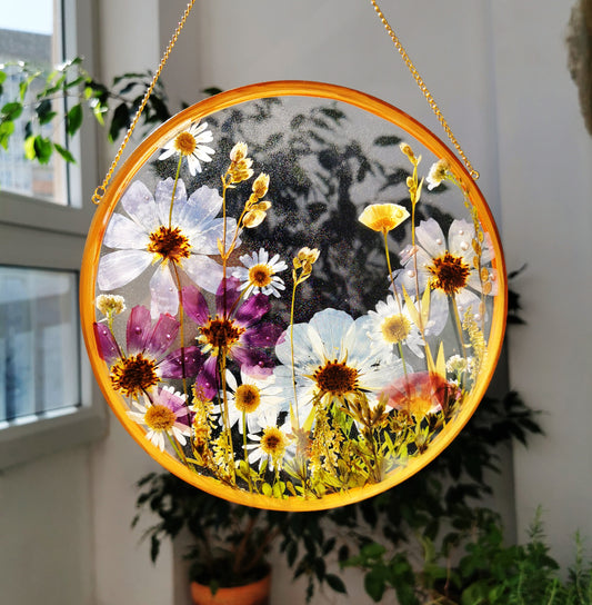 Framed pressed flower in resin hanging frame